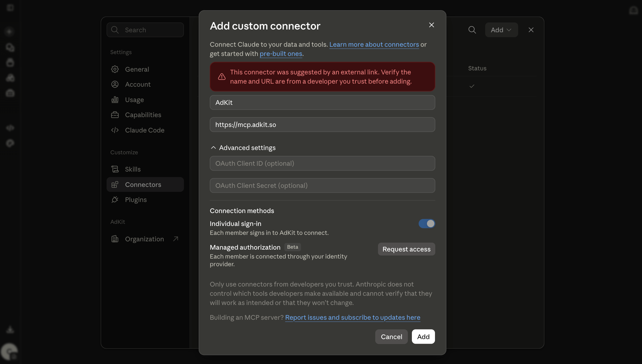 The Add custom connector dialog in Claude settings, with the name AdKit and the URL mcp.adkit.so filled in